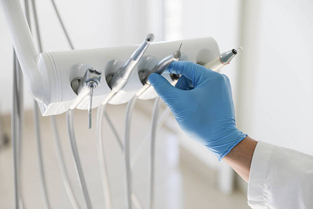 Professional Tooth Extraction technician working in Kent, WA